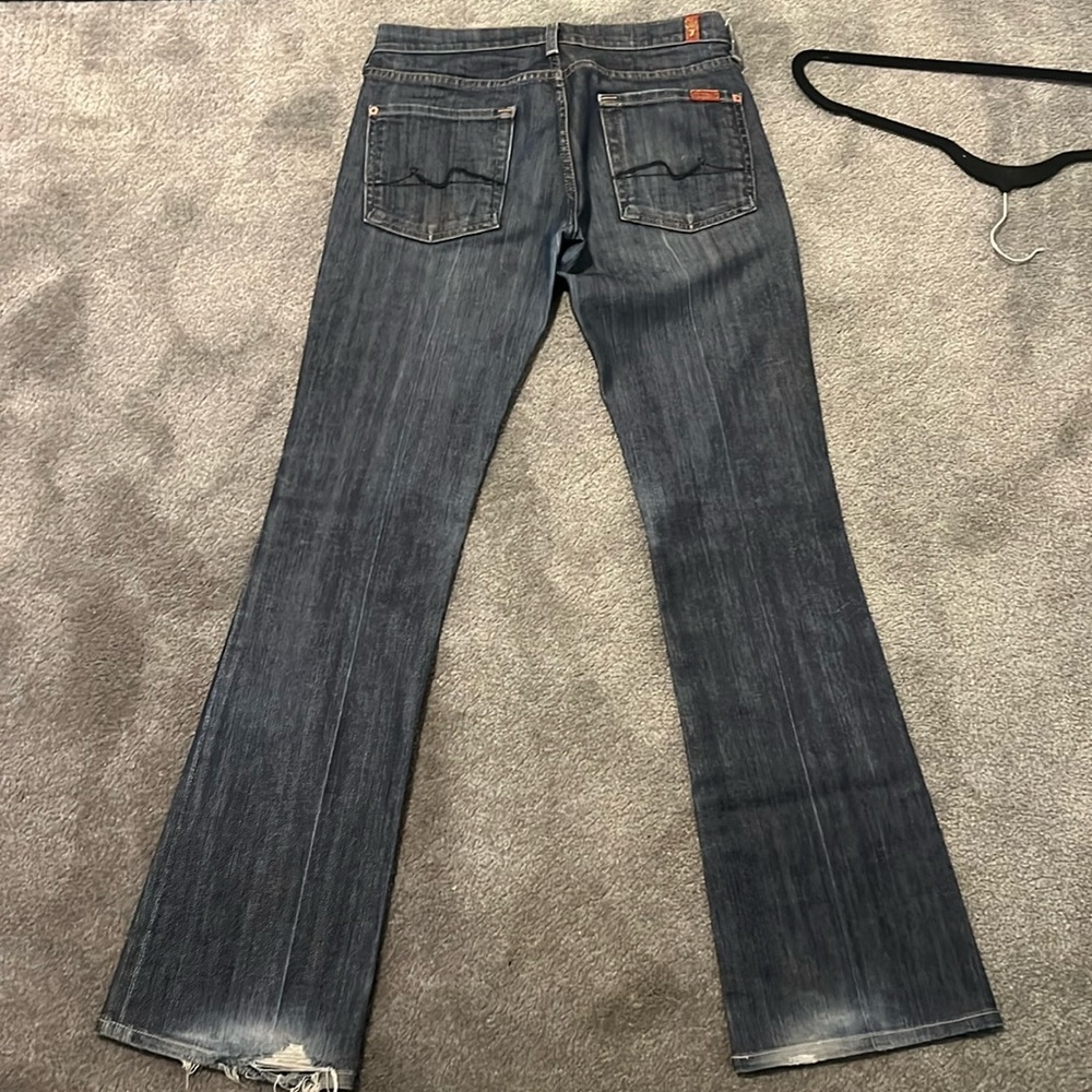 7 for all mankind jeans, size 27! Has ruffles on bottom but can hem they r long